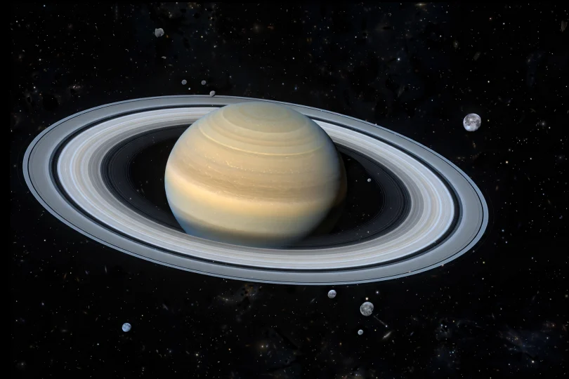Telescope image stack revealing faint moons around Saturn