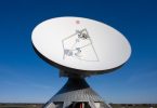 A communications satellite in orbit above the Earth