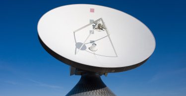 A communications satellite in orbit above the Earth