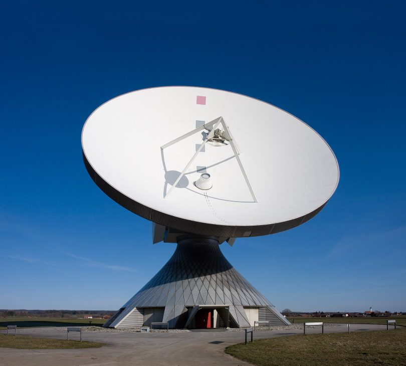A communications satellite in orbit above the Earth