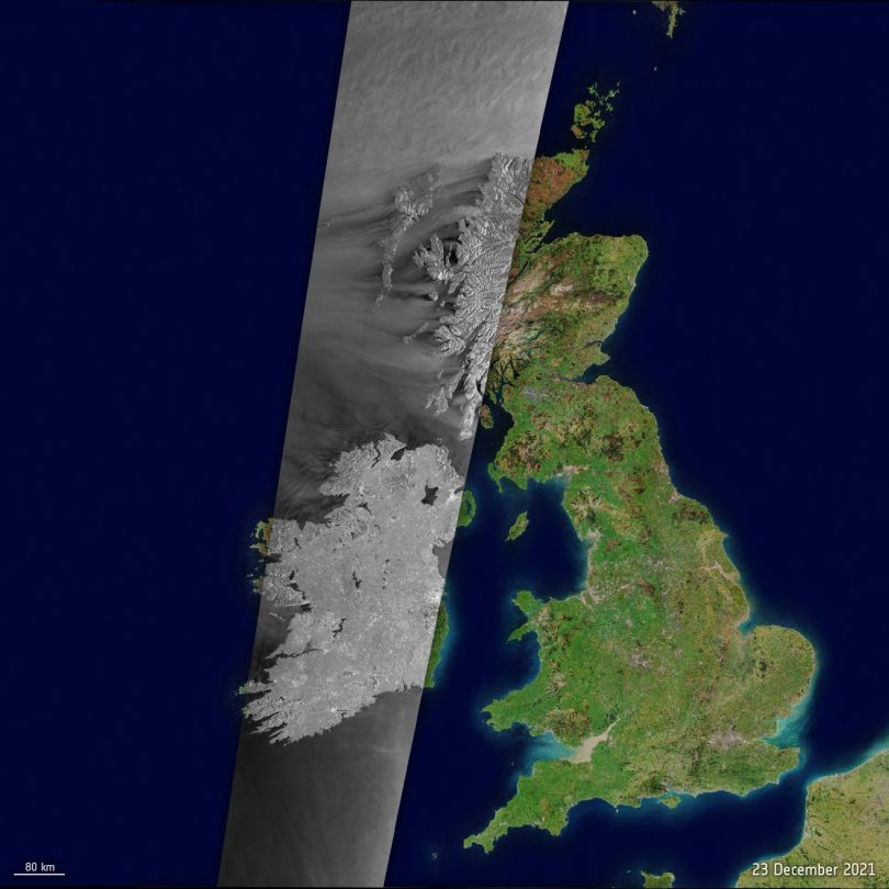 A communications satellite orbiting above Earth